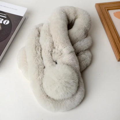 Thick, off-white rabbit fur triple-tube scarf featuring a soft pom-pom detail.