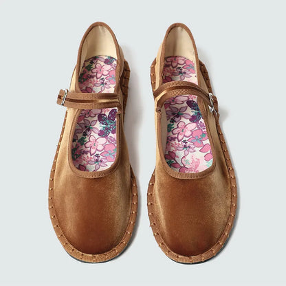 Women's floral-lined Mary Jane flats with buckle strap