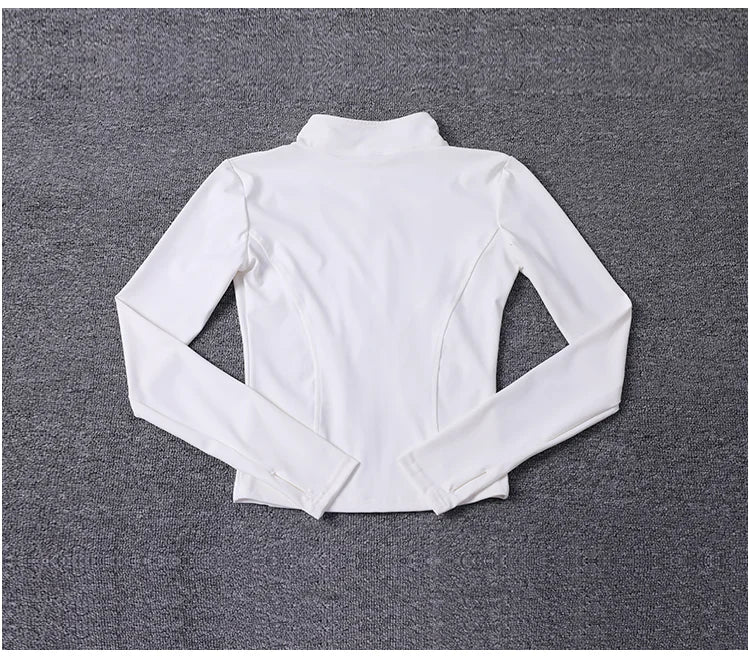 White long-sleeve polyester sport jacket with a fitted design and thumbholes for yoga training.