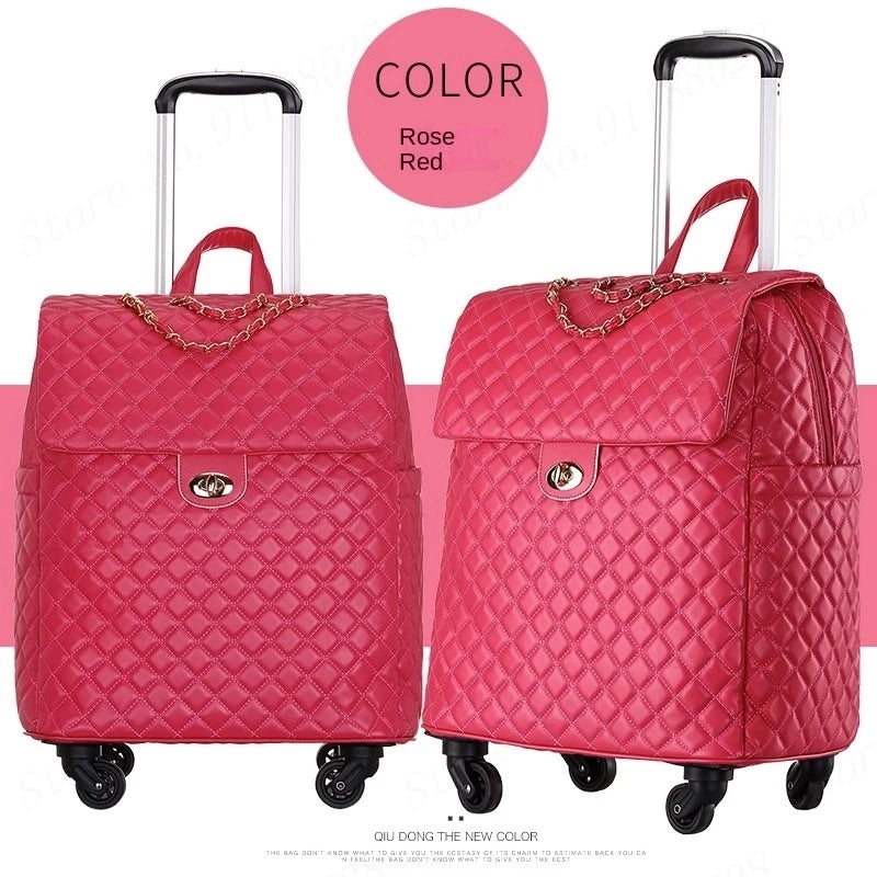 Rose red quilted PU leather rolling suitcase with a gold chain accent, turn-lock closure, and retractable handle.