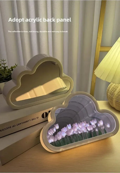 Cloud-shaped acrylic mirror panels with LED tulip night light for desk decor, creating a soft ambient glow.