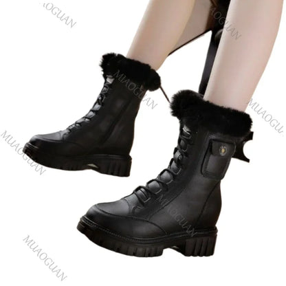 Black leather lace-up chunky snow boots with fur trim, side pocket detail, and lug soles.