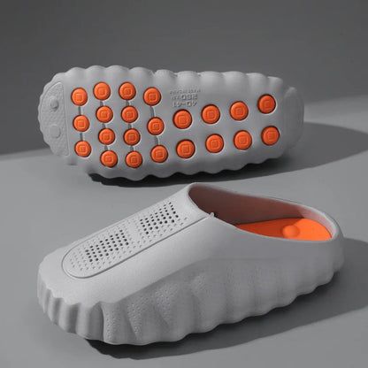 Grey EVA sandals with orange massage nodules and non-slip soles for comfortable daily wear.