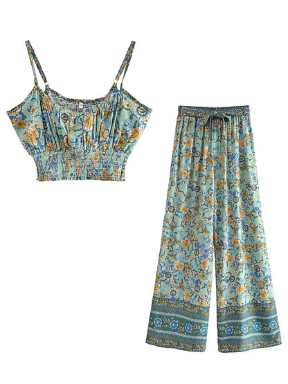 Green flowy floral two-piece set with a smocked cropped top and wide leg drawstring pants for casual summer wear.