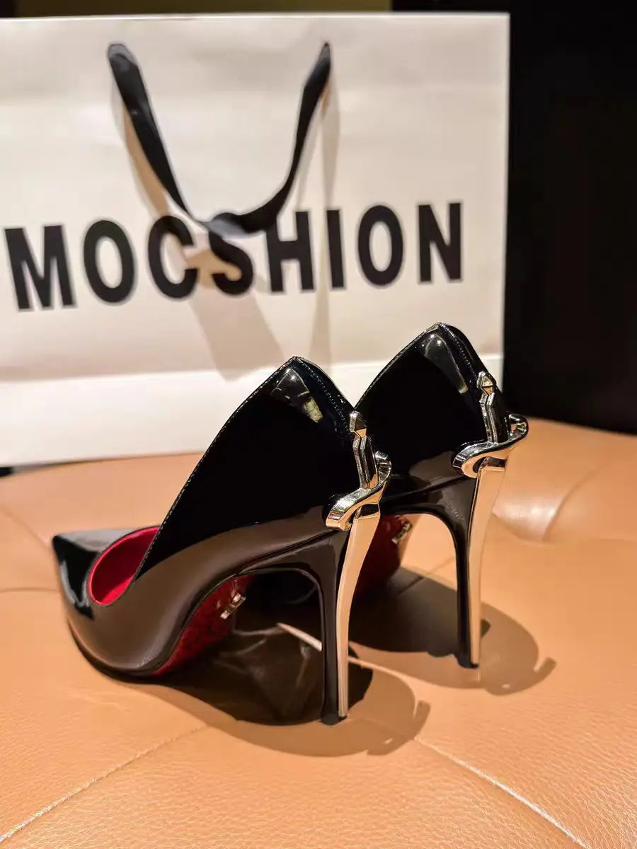 Black pointed toe stiletto pumps with silver heels and red lining for evening events.