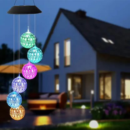 Home decor solar wind chimes with hanging LED lit spheres outdoors