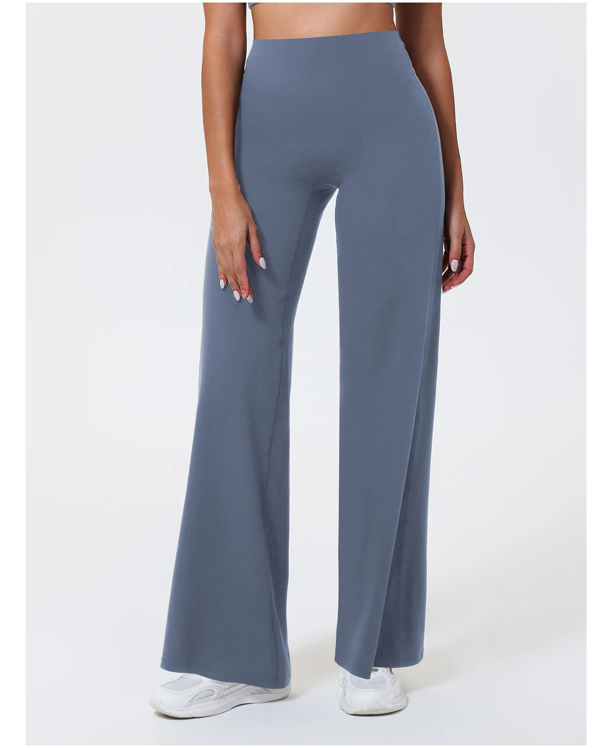 Blue high waist compression leggings in stretchy knit fabric for yoga.