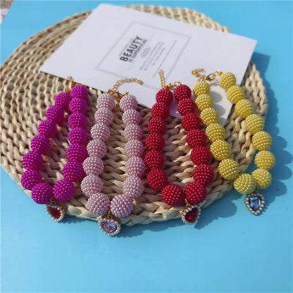 Heart-detail pet collar with pearl-style accents