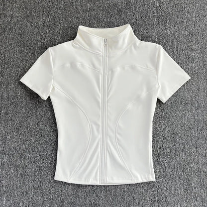 White short-sleeve sculpting yoga top with a full zip stand collar for fitness training.