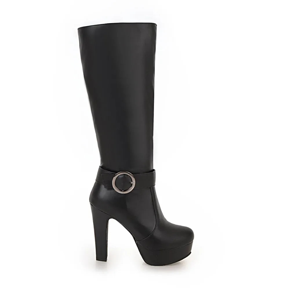 Black faux leather knee-high platform boot with a high block heel and ankle strap featuring a round metal buckle.