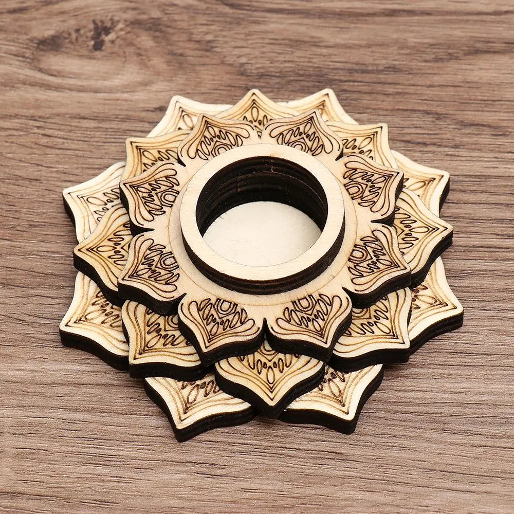 Layered wooden crystal ball stand featuring laser-engraved lotus flower patterns on a wooden surface.