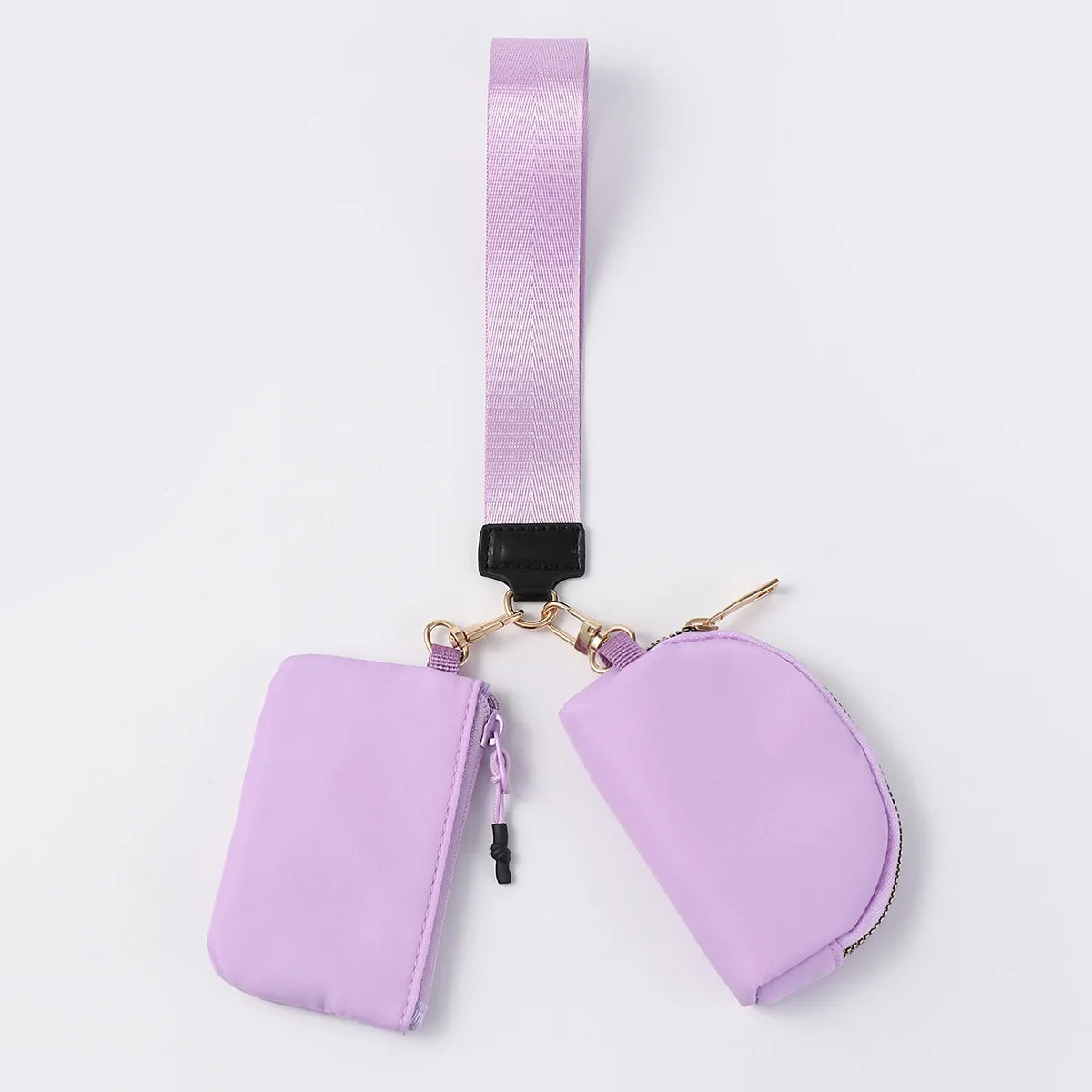 Light purple nylon dual pouch with zip closure and wrist strap for carrying daily essentials in this wallet.