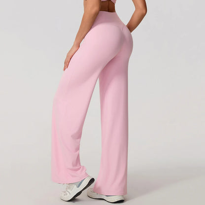 Light pink high waist sculpting leggings in a stretchy knit for exercise.