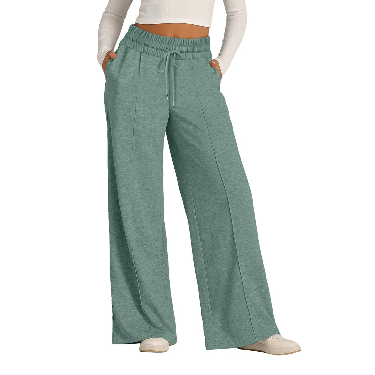 Sage green fleece-lined high waist wide leg pants with a drawstring, worn for lounging.
