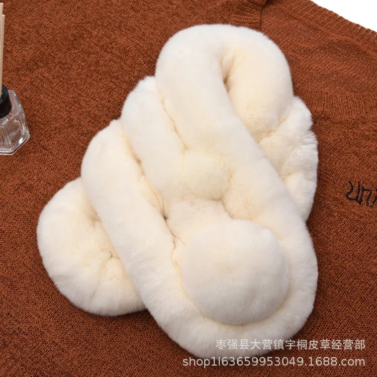 Thick, short white rabbit fur scarf with a triple-tube design and a pom pom accent.