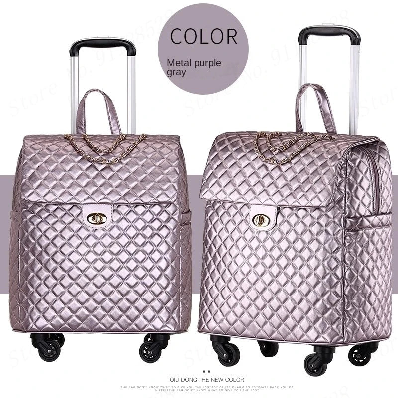 Metal purple-gray PU rolling suitcase with quilted diamond pattern, twist-lock flap, chain detail, and telescoping handle.
