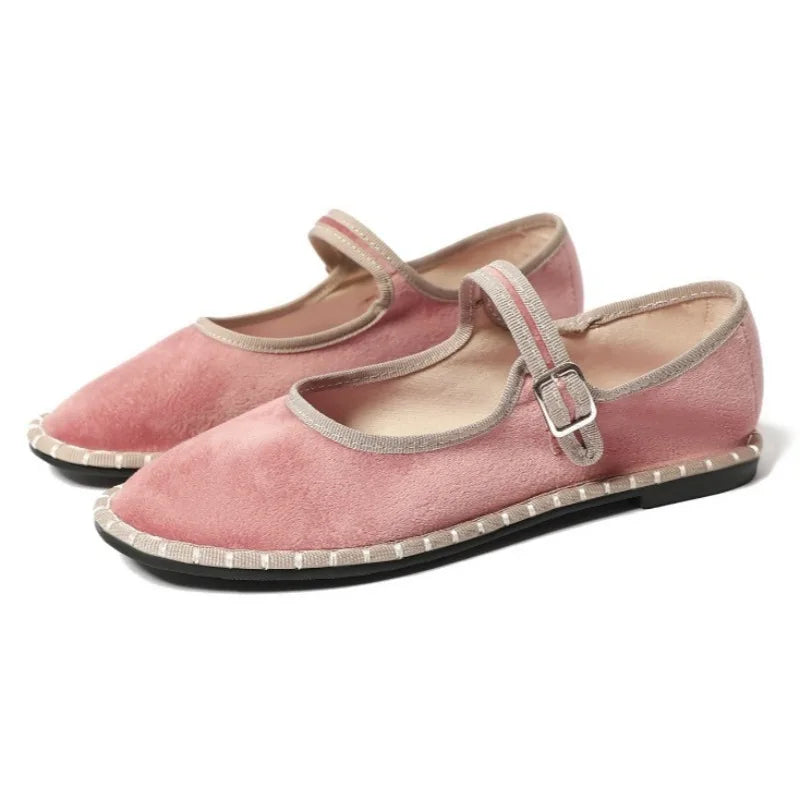 Women's floral-lined Mary Jane flats with buckle strap