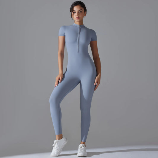 Light blue fitted seamless jumpsuit with a zip front for yoga and workouts.