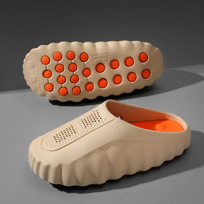 Beige EVA clogs with orange massage soles and non-slip textured outsoles for casual daily wear.