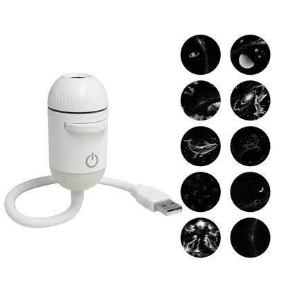 White portable LED star projector with USB cable and multiple nebula slides for ceiling projection in a bedroom.