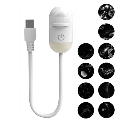 White portable LED projector with USB cable and nebula patterns for relaxing ceiling light in bedrooms.