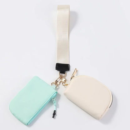 Mint and beige nylon dual pouch wristlet wallet with zip closure for daily errands.