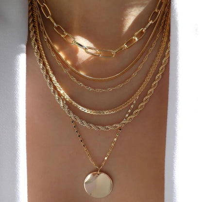 Necklace set layered pendant chains with round medallion charm and various link styles