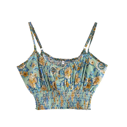 Green floral crop top with flowy fabric and a smocked bodice for a summer outfit.