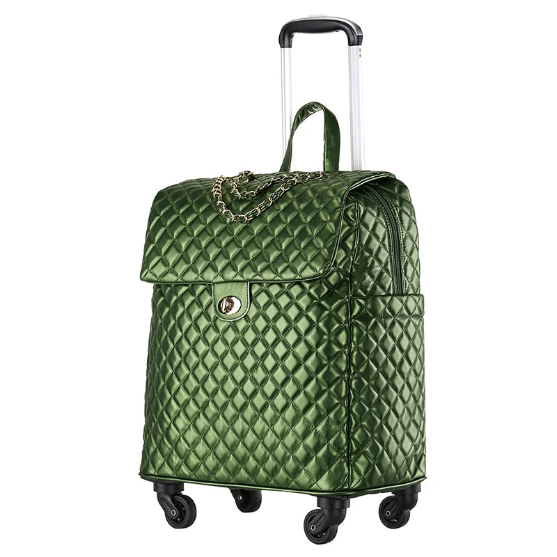 Green quilted PU leather rolling suitcase with gold chain detail, twist-lock flap, and a telescoping handle.