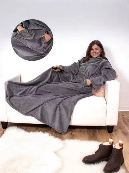 Adult wearable blanket with sleeves and a large pocket