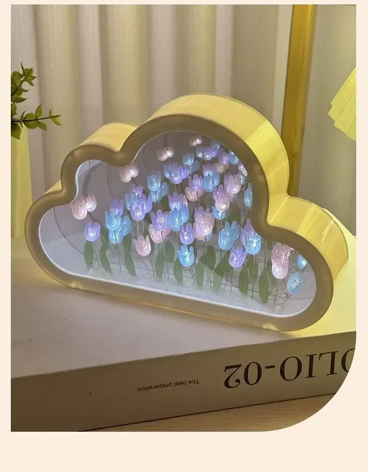 Cloud-shaped yellow mirror frame with LED tulip flowers for ambient desk decor.