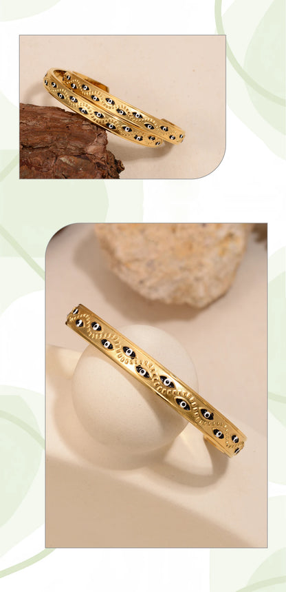 Women’s stainless steel cuff bracelet with an evil eye motif