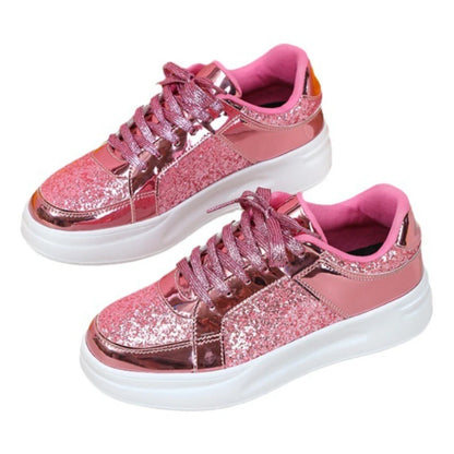 Pink sequin and metallic lace-up casual sneakers with thick white soles.