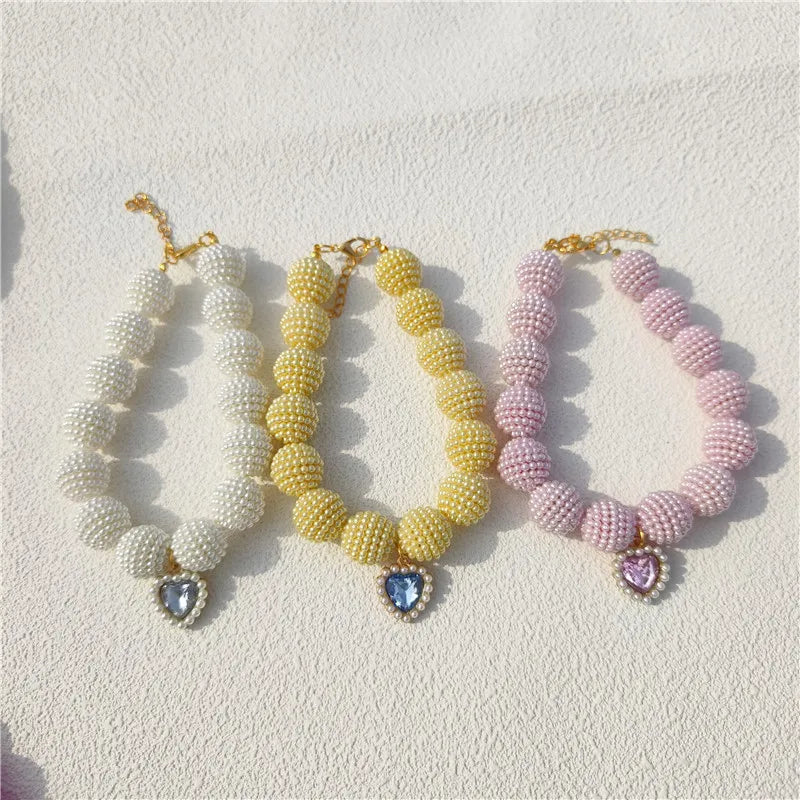 Heart-detail pet collar with pearl-style accents