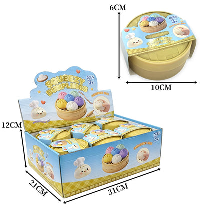 Soft, colorful silicone dumpling squishies in a bamboo-style case for a sensory fidget toy.