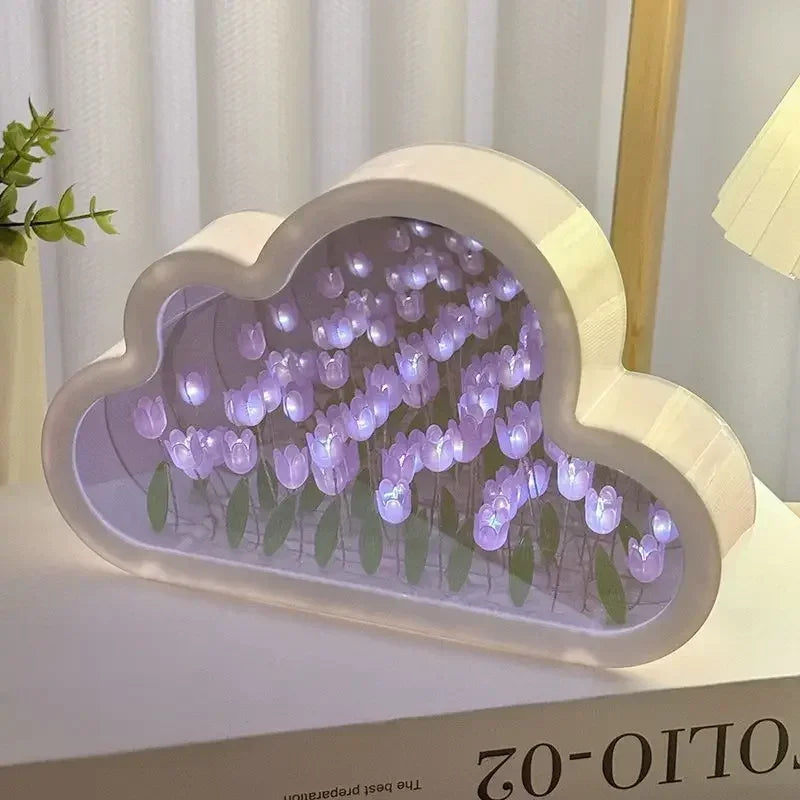 White cloud mirror panel with purple LED tulip flowers as desk decor for ambient light.