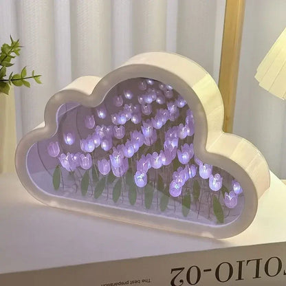 White cloud mirror panel with purple LED tulip flowers as desk decor for ambient light.