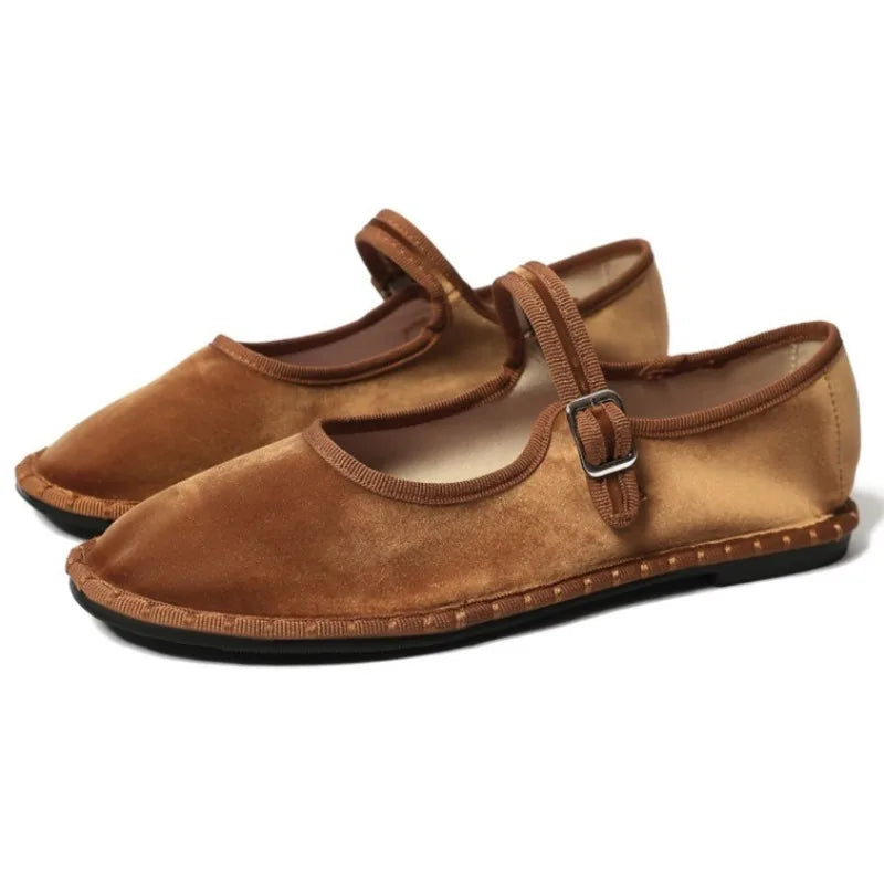 Women's floral-lined Mary Jane flats with buckle strap