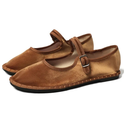 Women's floral-lined Mary Jane flats with buckle strap