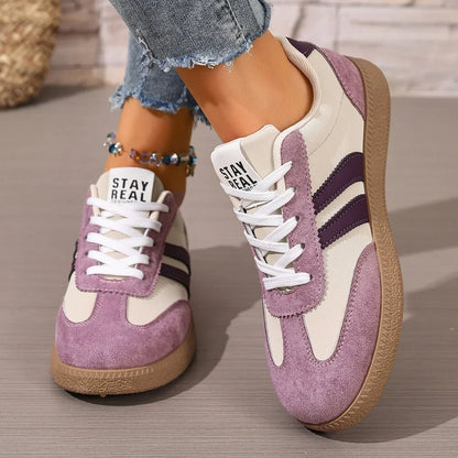 Purple and cream suede women’s leather slip-on sneakers with gum soles for casual daily wear.