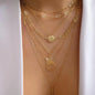 Women's Goldtone Necklace Set With Braided Bead Chains And Star Pendants In Five-Length Array