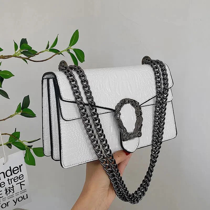 Textured Leather Crossbody Bag With Crocodile Pattern And Durable Build And Everyday Chain Strap