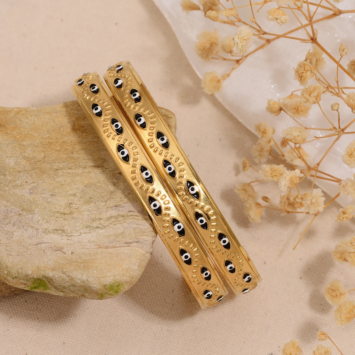 Women’s stainless steel cuff bracelet with an evil eye motif