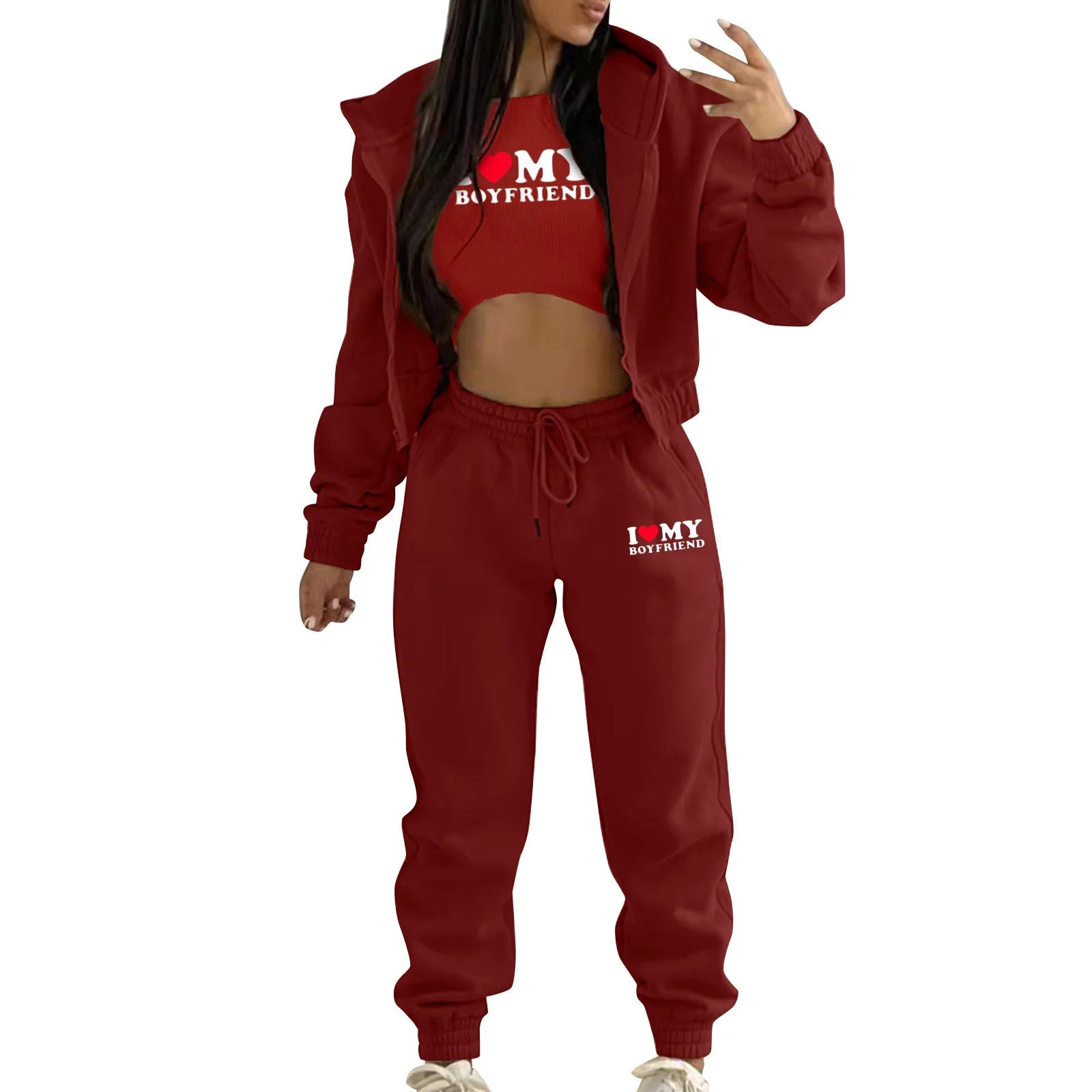 Red knit sweater set with hooded zip jacket, crop top, and drawstring sweatpants for lounging.