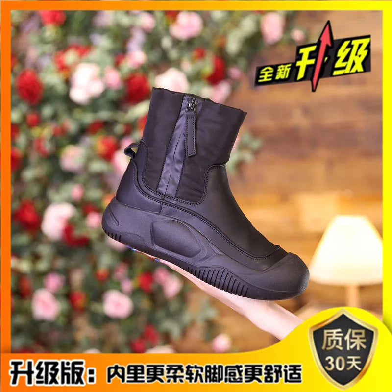Black waterproof short winter boot with a thick sole and side zipper.