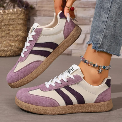 Purple and cream suede women's leather slip-on sneakers with cushioned soles for daily casual wear.