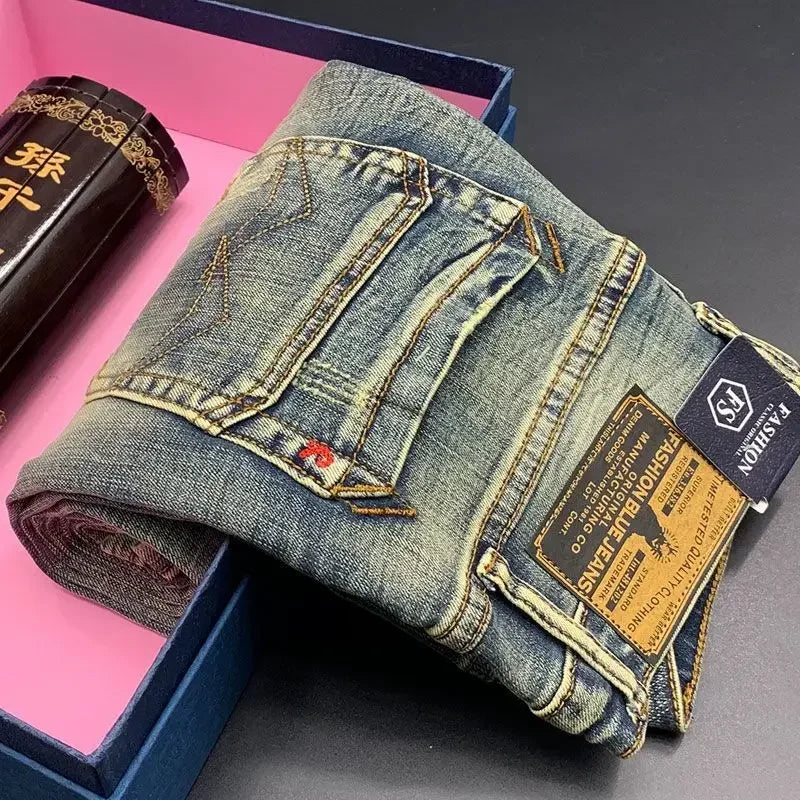 Folded blue, distressed, midweight stretch jeans with back pockets for daily comfort.