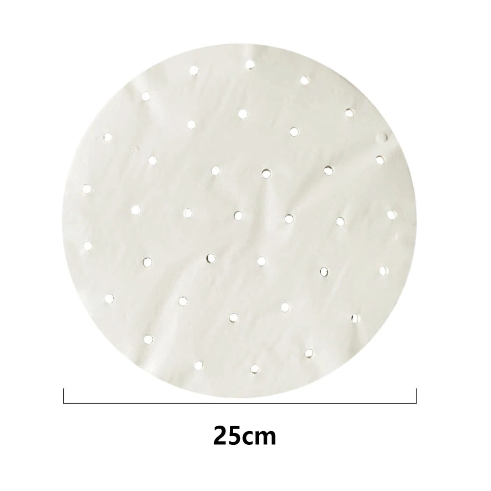White 25cm round steamer paper liner with evenly spaced steam holes for bamboo dumpling baskets.