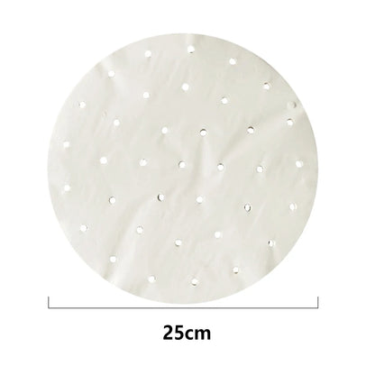 White 25cm round steamer paper liner with evenly spaced steam holes for bamboo dumpling baskets.