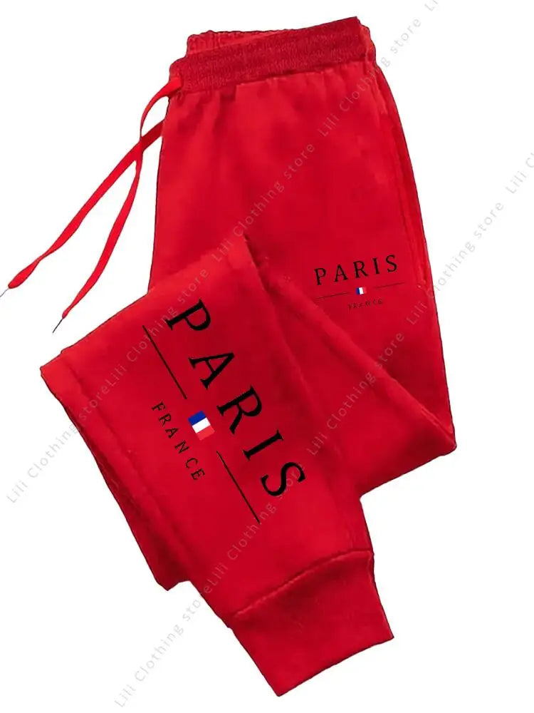 Red fleece-lined high waist jogger pants with Paris graphic for lounge wear.